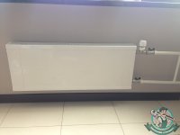 Термоголовка на панельном радиаторе